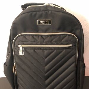 reaction black and gold backpack